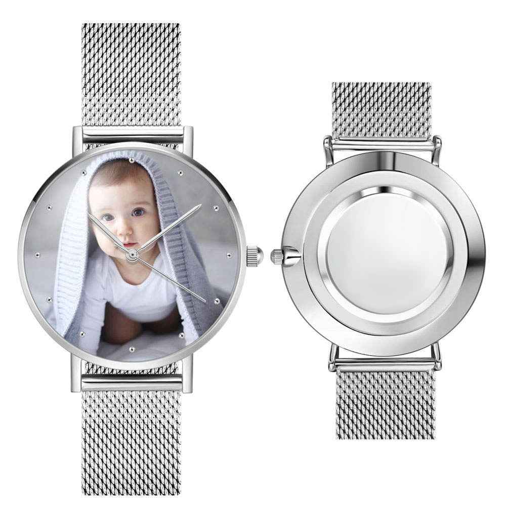 A silver watch that can be customized with a photo.