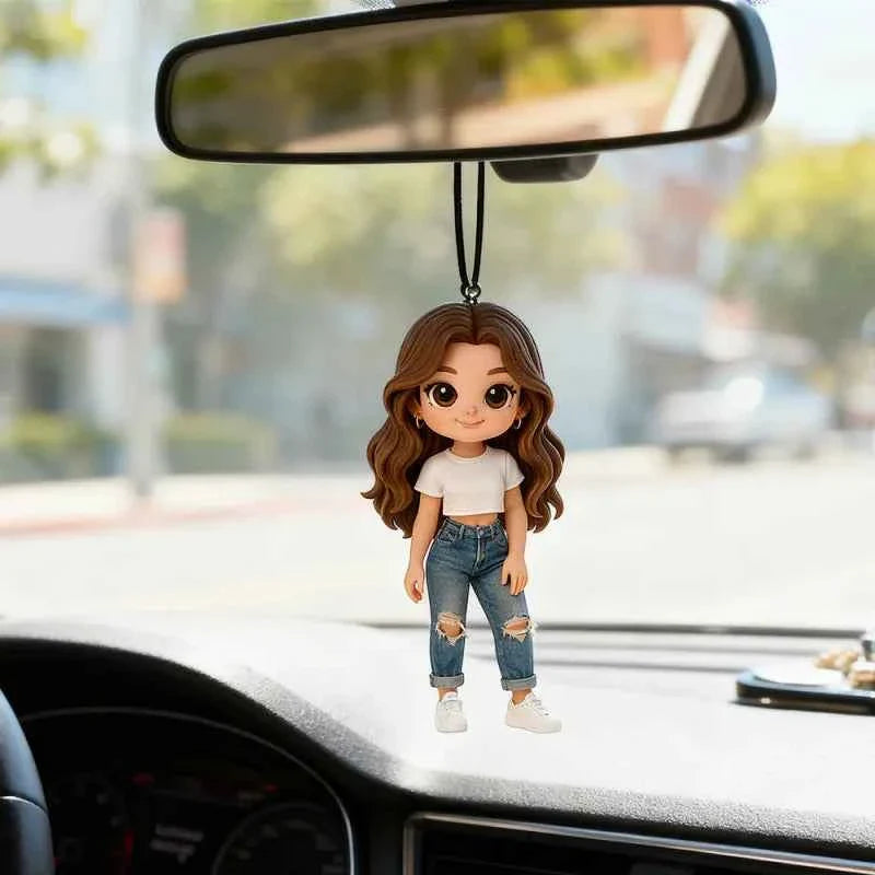 This 3D figurine of a girl can be used as a car decoration or a keychain.